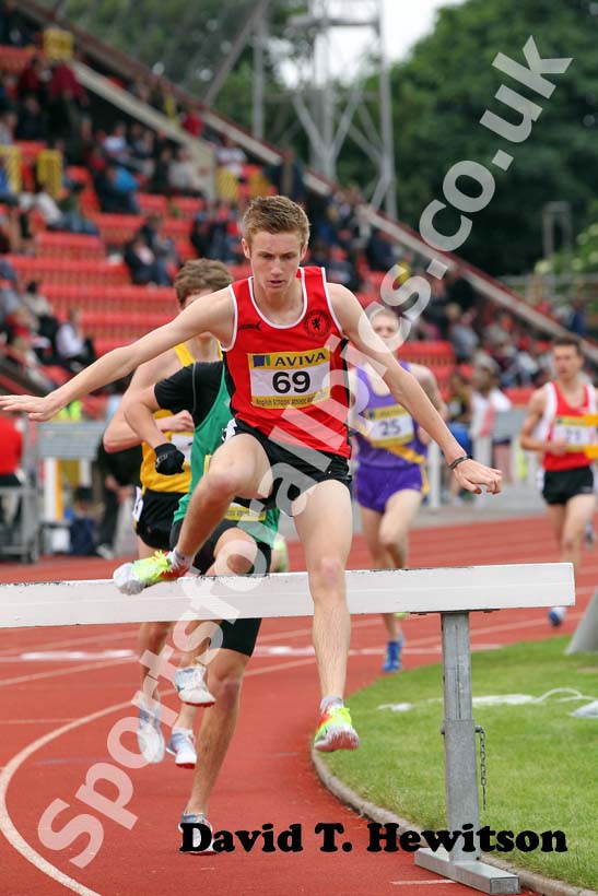 Blair Brown (Somerset) on his way to winning the Senior Boys 2000 metres Steeplechase.